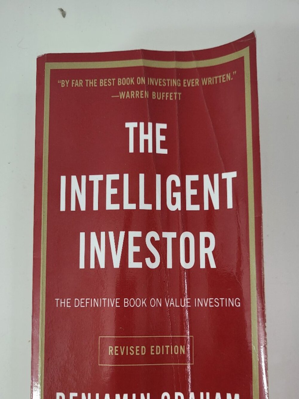 The Intelligent Investor: The Definitive Book on Value Investing by Benjamin Gra